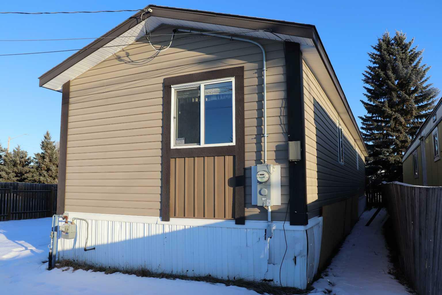 Property Photo:  810 52 Street  AB T7E 1K4 