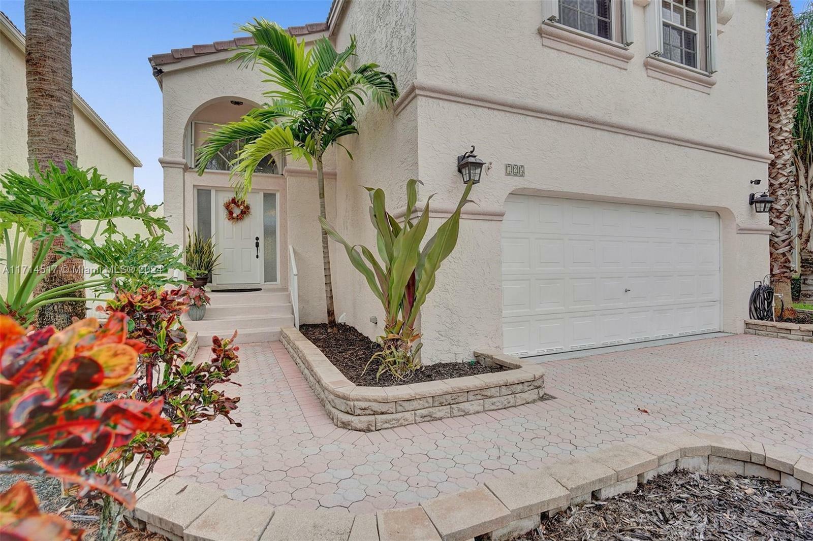 Property Photo:  725 NW 156th Ave  FL 33028 