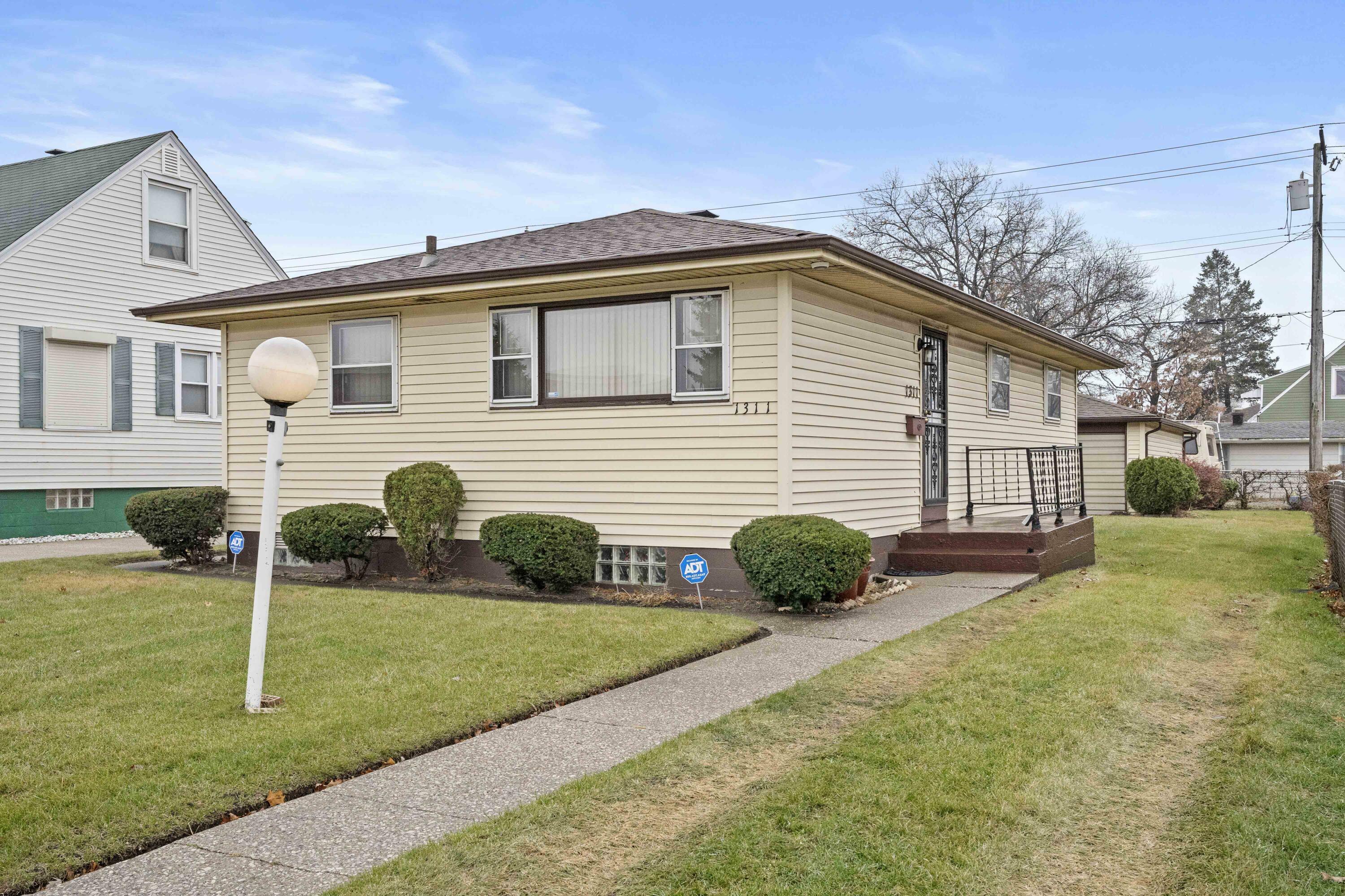 Property Photo:  1311 E 19th Avenue  IN 46407 