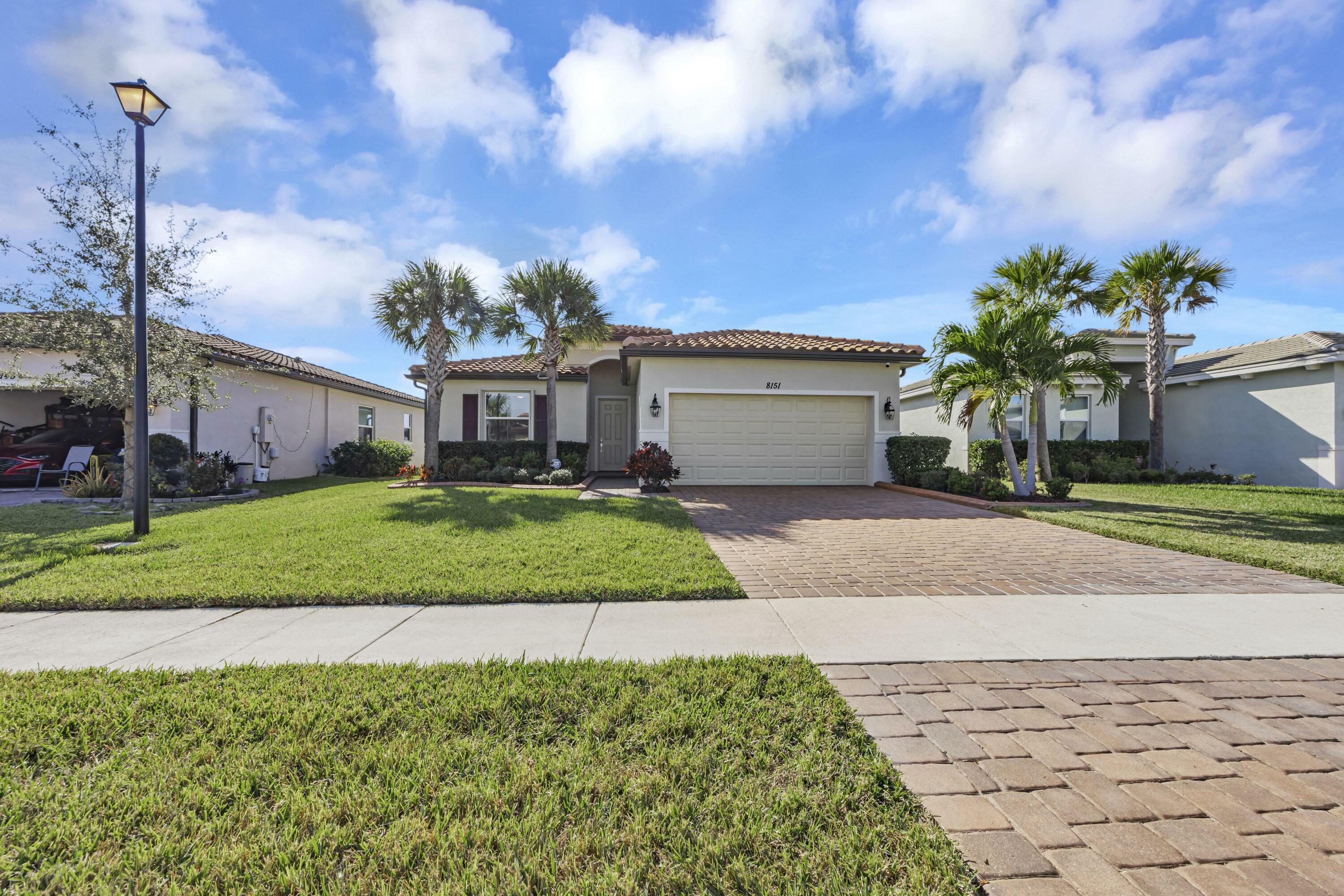 Property Photo:  8151 NW Greenbank Circle  FL 34987 