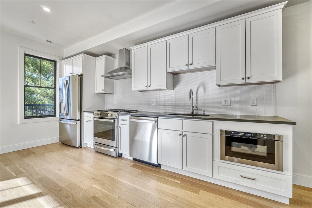 Property Photo: 120 Moore St 202 MA 02128