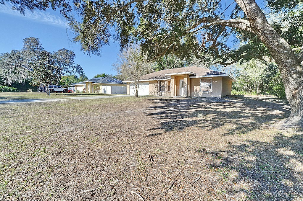 Property Photo:  2406 Ranchland Street  FL 34453 