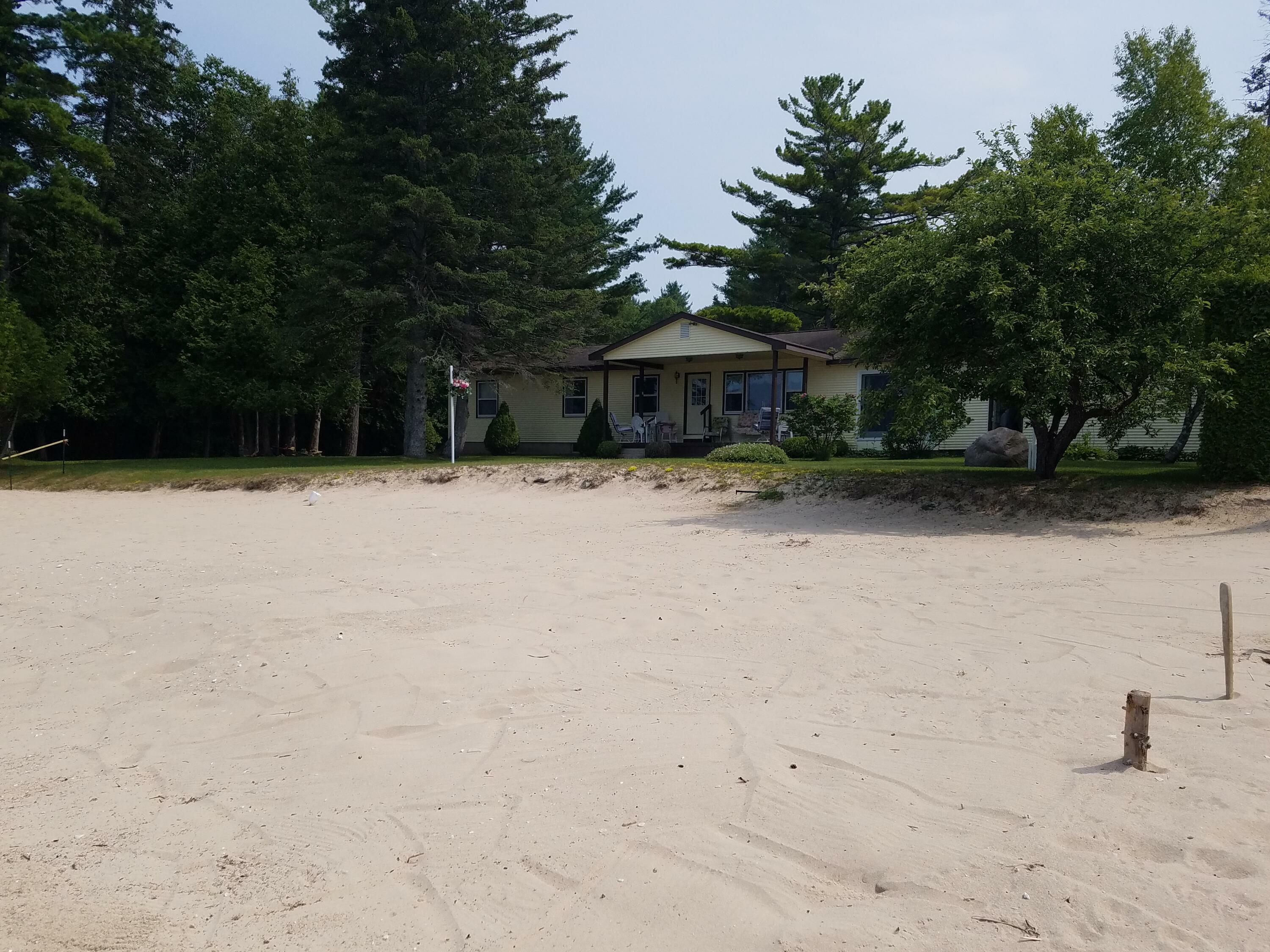 Property Photo:  1122 Shore Drive  MI 49721 