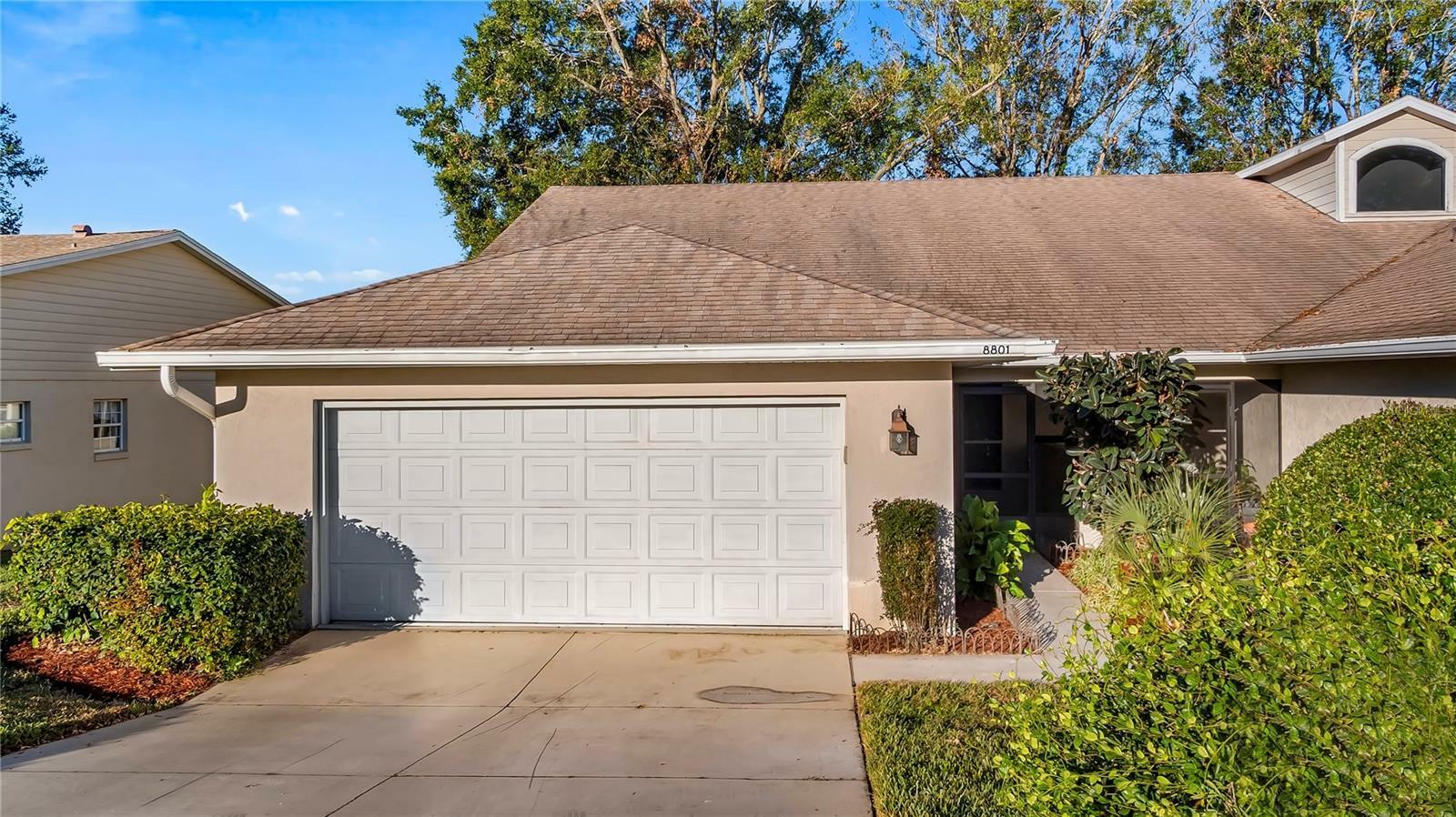 Property Photo:  8801 Village Green Boulevard  FL 34711 