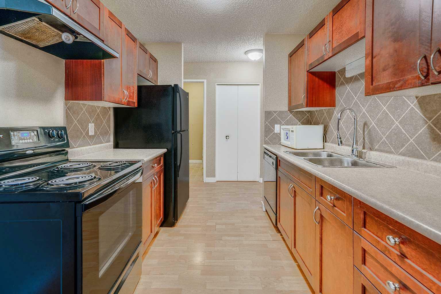 Property Photo:  7164 Parke Avenue 305  AB T4P 1M9 