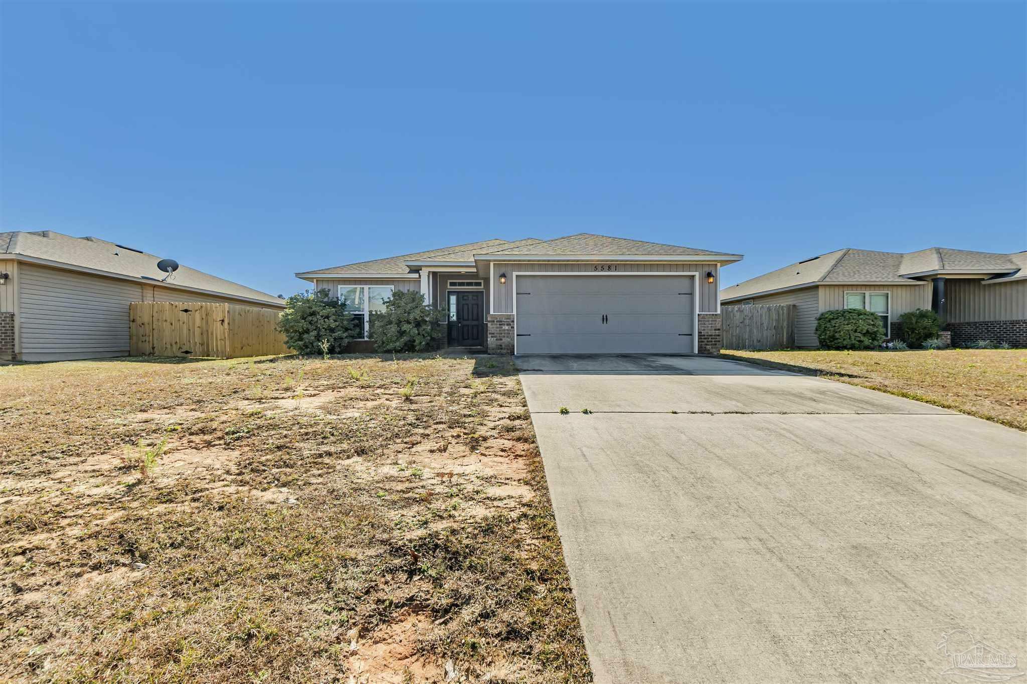 Property Photo:  5581 Peach Dr  FL 32571 