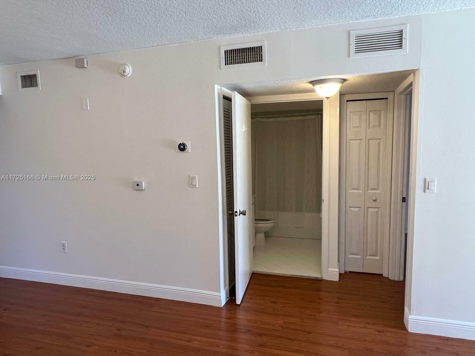 Property Photo:  945 NE 34th Ave 103  FL 33033 