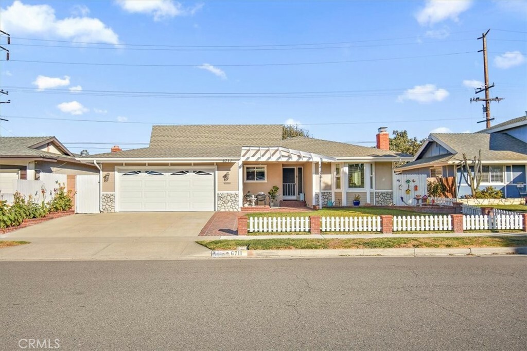 Property Photo:  6711 Walton Drive  CA 92647 