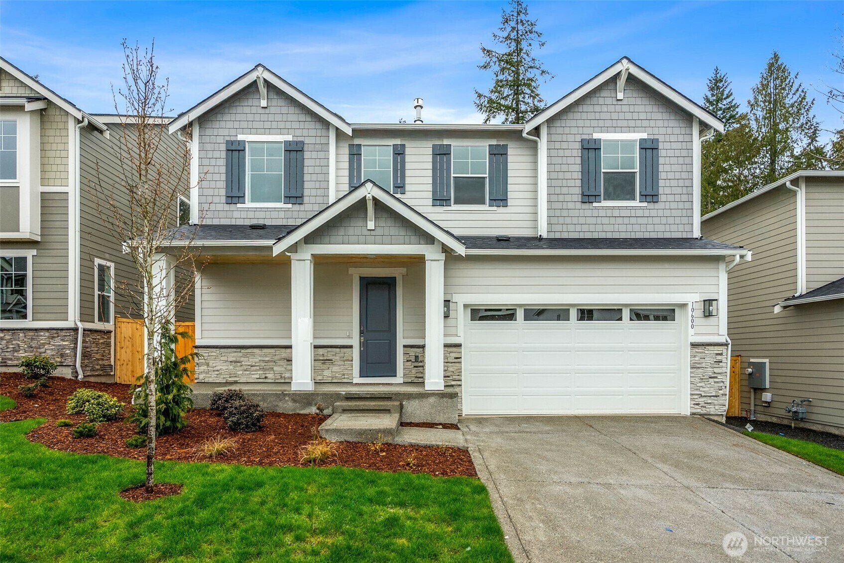 Property Photo: 10600 Treasure Drive NW 103 WA 98383