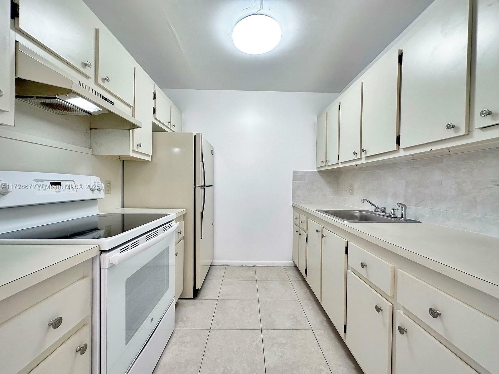 Property Photo:  101 SW 132nd Way 309-J  FL 33027 