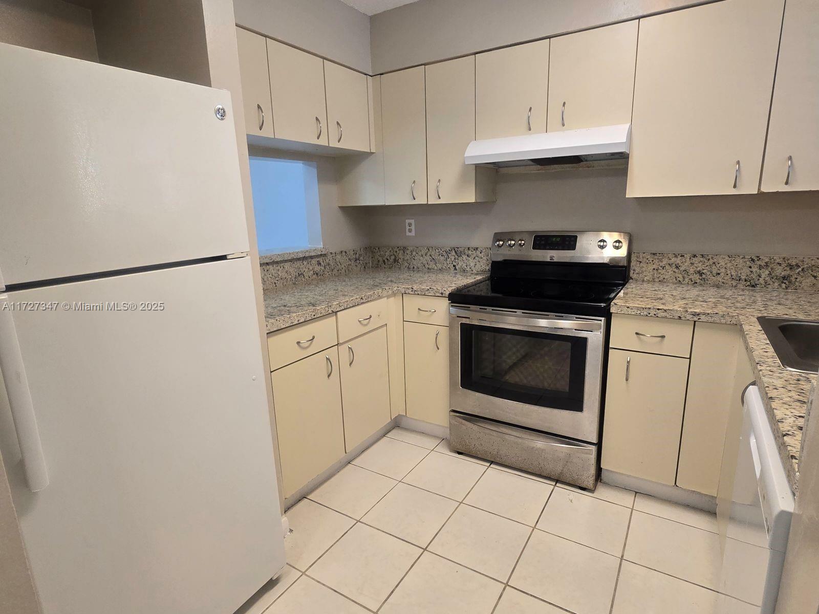 Property Photo:  14961 SW 82nd Ln 21-202  FL 33193 