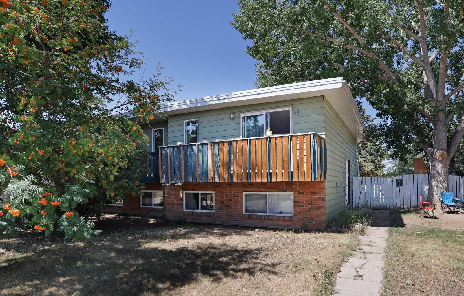 Property Photo: 45 Beamish Park Drive E AB T1R 0K1