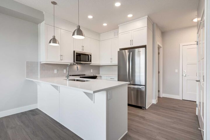 Property Photo:  175 Wolf Hollow Crescent SE 210  AB X0X 0X0 
