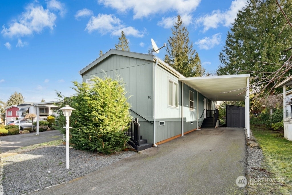 Property Photo:  4111  164th St SW 50  WA 98087 