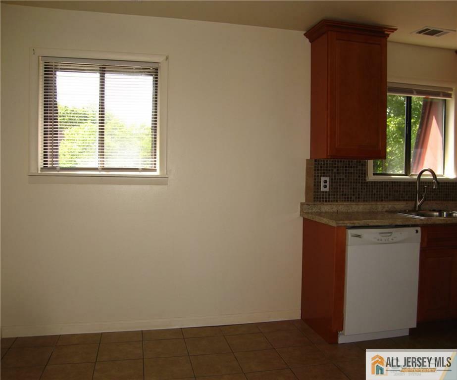 Property Photo:  1208 N Oaks Boulevard 08  NJ 08902 