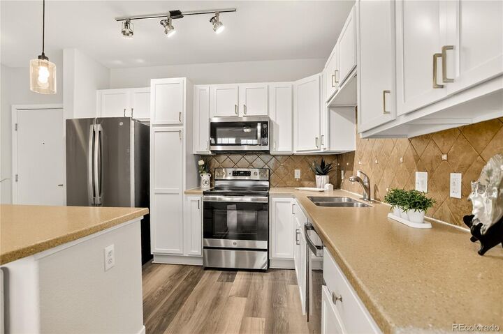Property Photo: 13456 Via Varra 406 CO 80020
