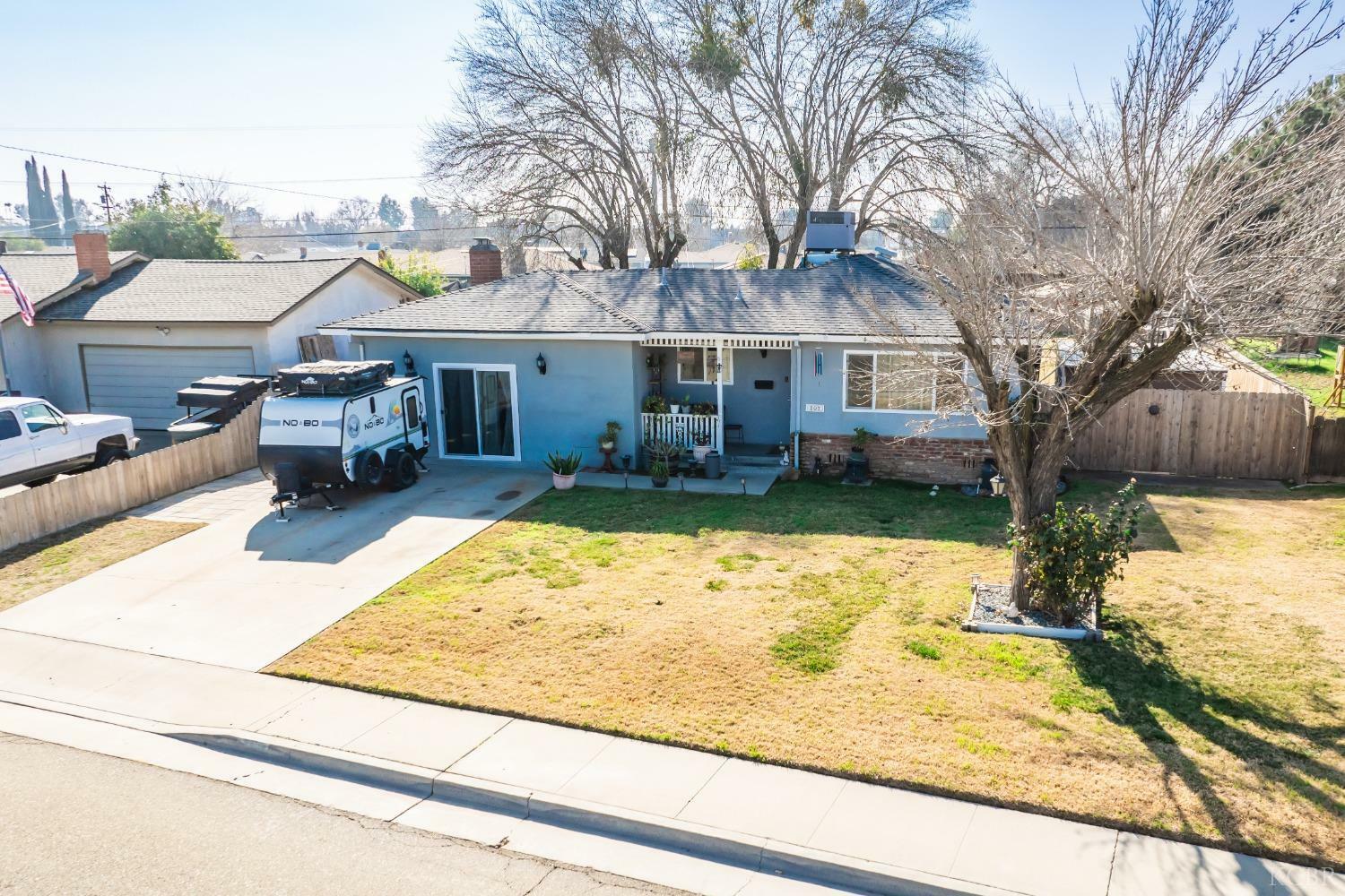 Property Photo:  207 W Burlwood  CA 93245 