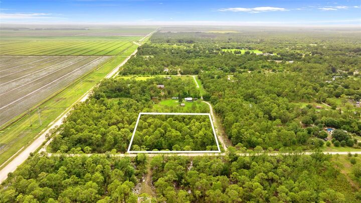Property Photo:  801 Yeehaw Avenue  FL 33440 
