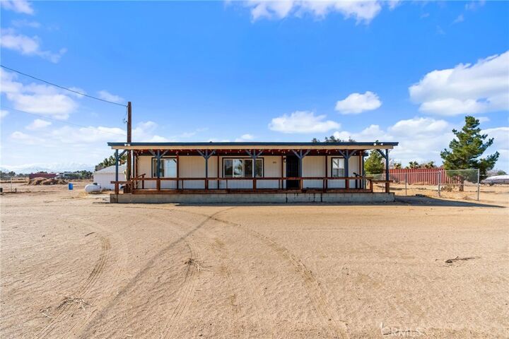 Property Photo:  11524 Paramount Road  CA 92371 