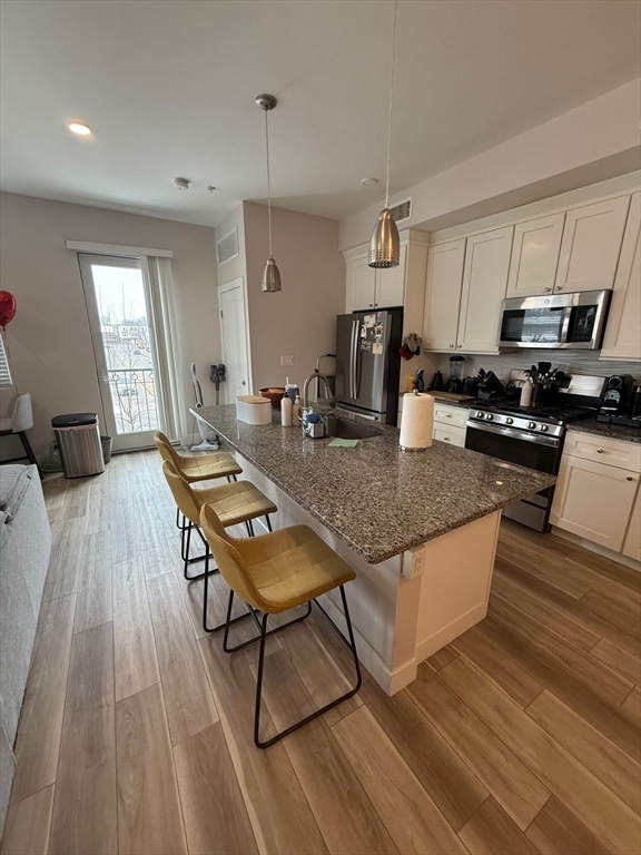 Property Photo:  99 Moody Street 1  MA 02453 