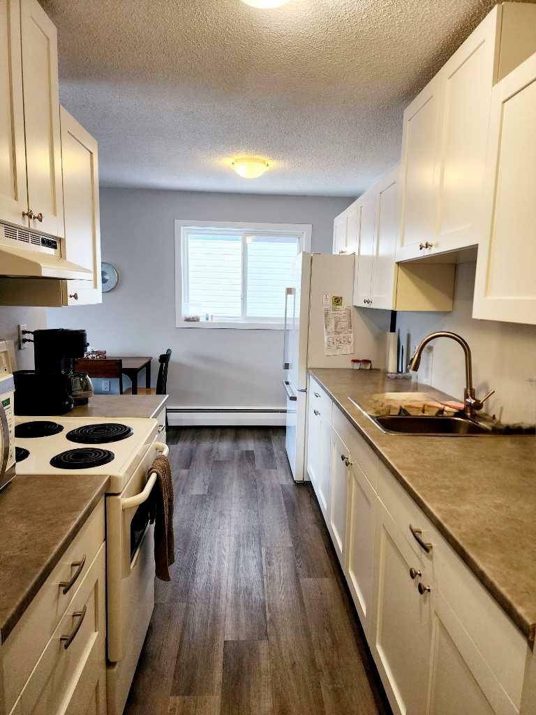 Property Photo:  4811 55 Street 306  AB T4N 2J2 