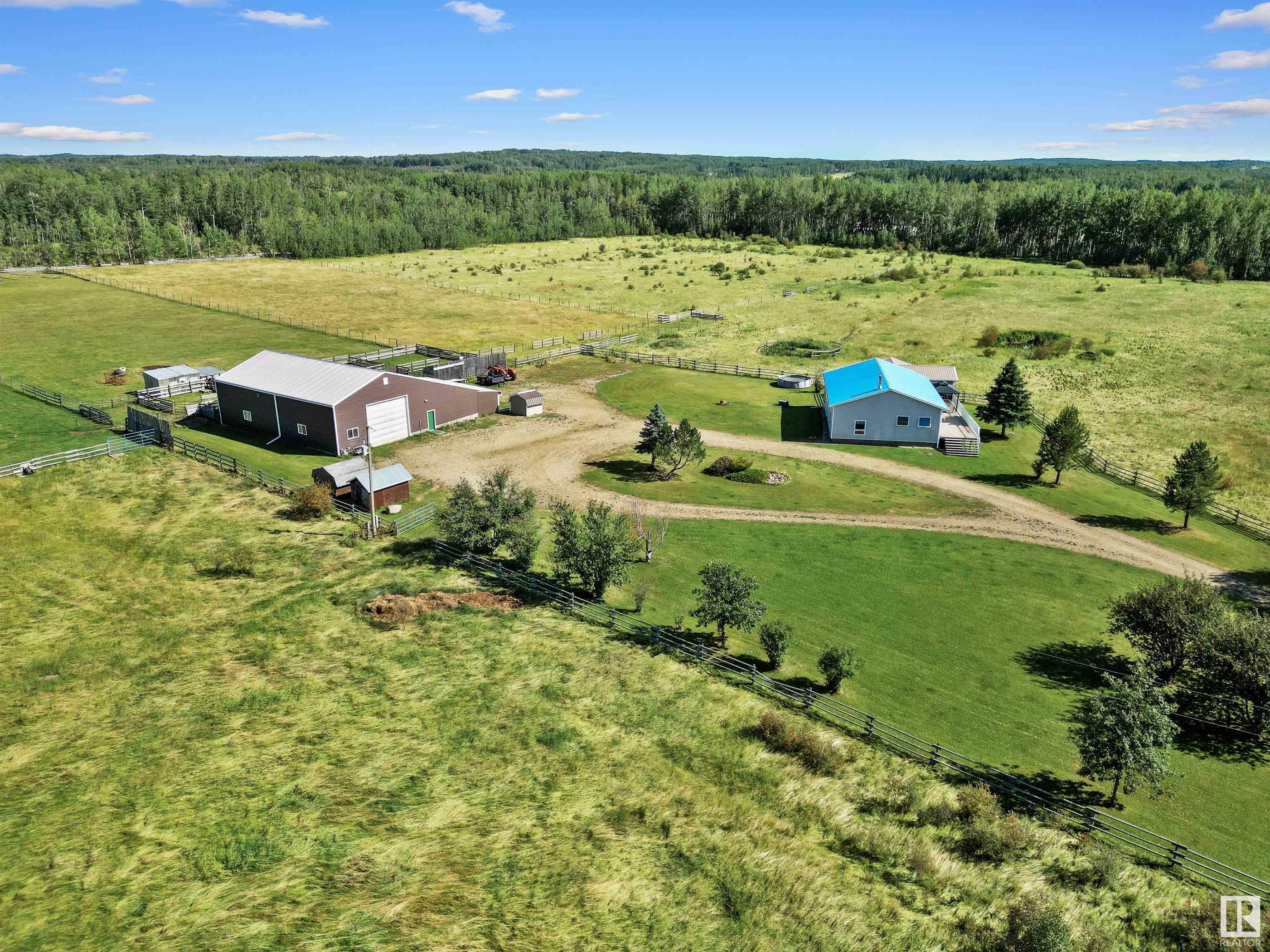 Property Photo:  452057 Rge Rd 70A  AB T0C 0A0 