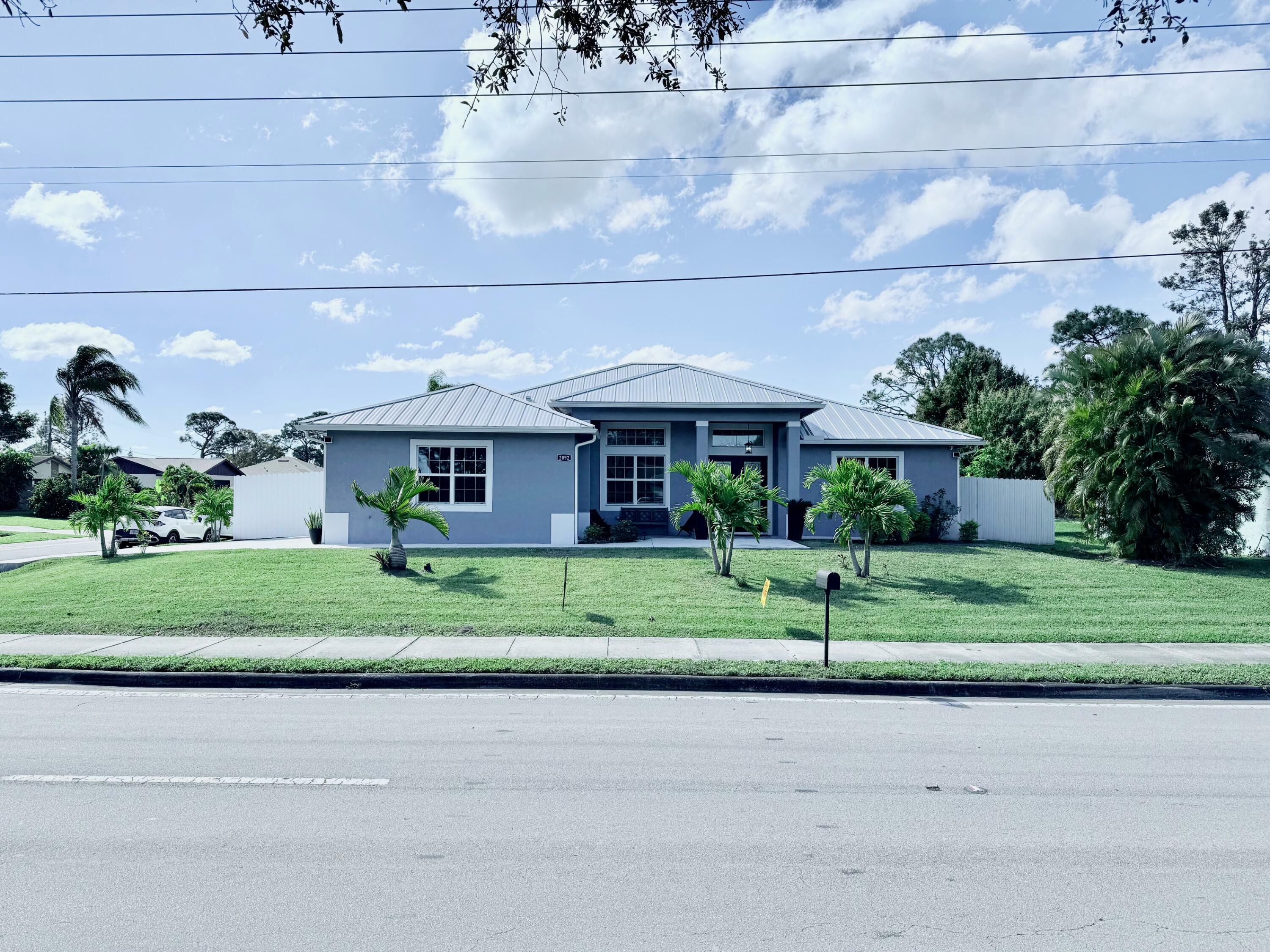 Property Photo: 2092 SW Airoso Boulevard FL 34984