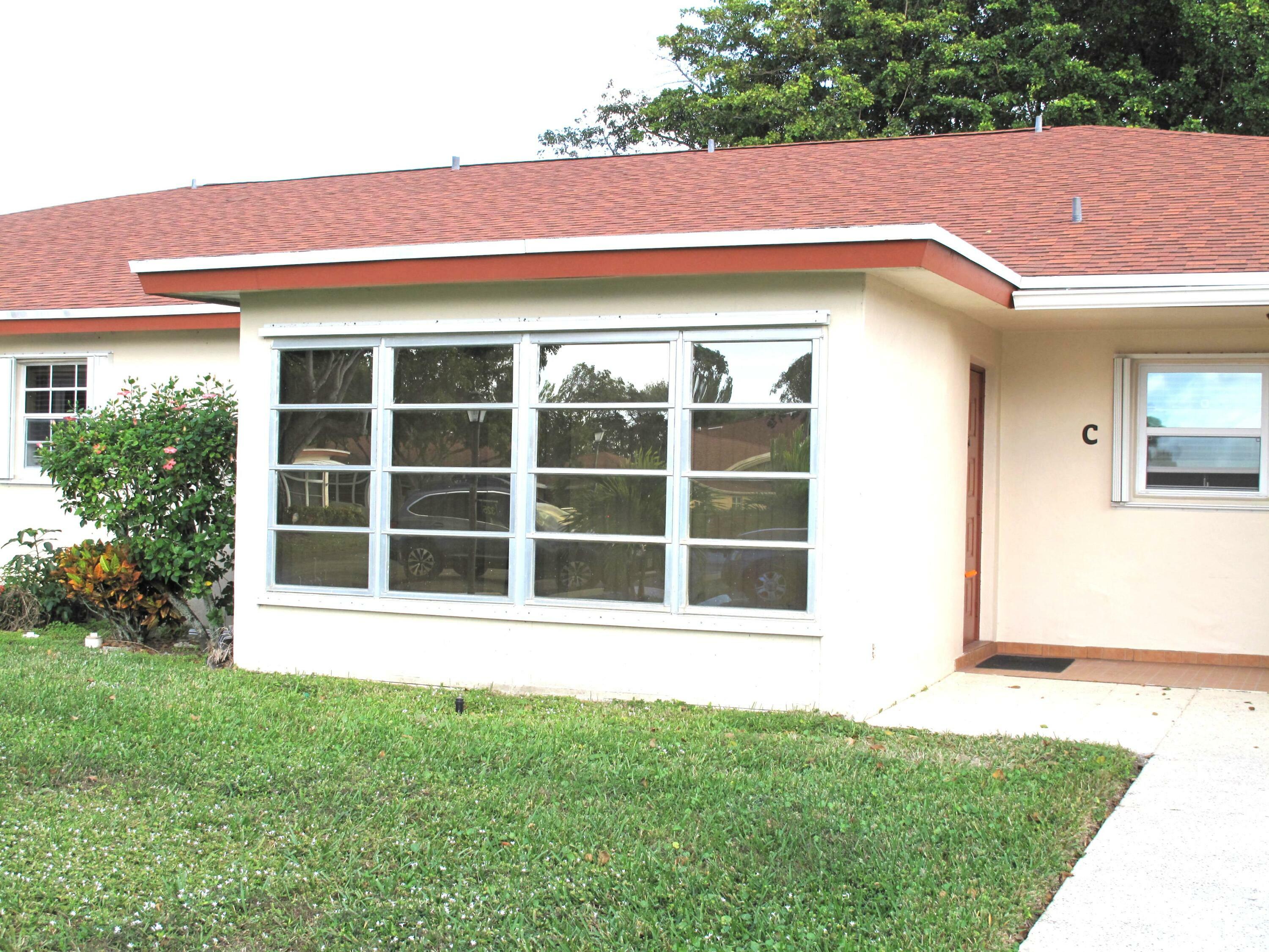 Property Photo:  325 NW 50th Avenue C  FL 33445 