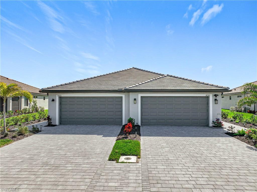 Property Photo:  14143 Winding Cedar Way  FL 33913 