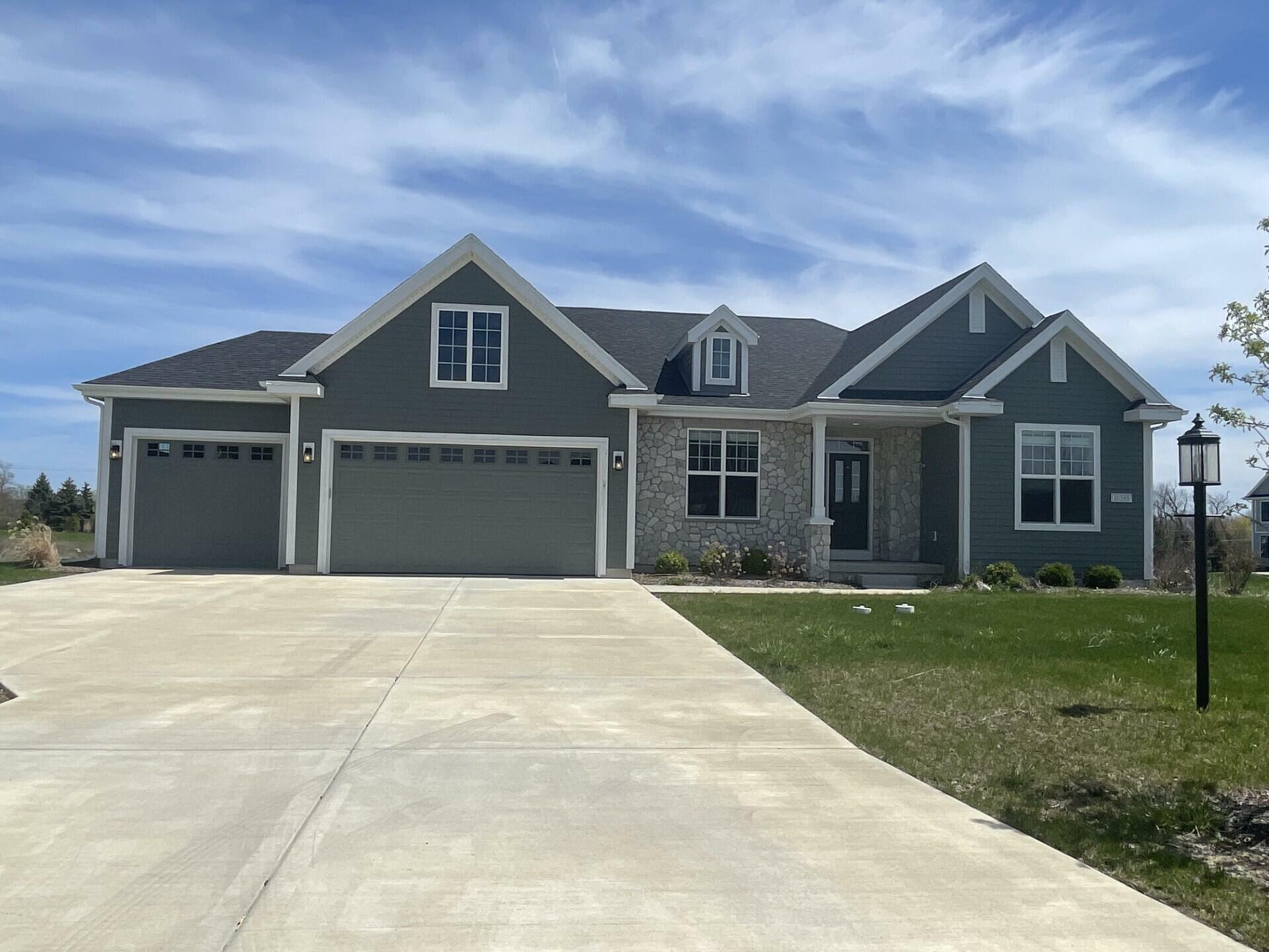 Property Photo: 10588 N Coneflower Ct WI 53097