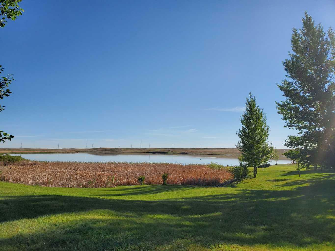 Property Photo: 27 Blue Heron Bay AB T1R 0X5
