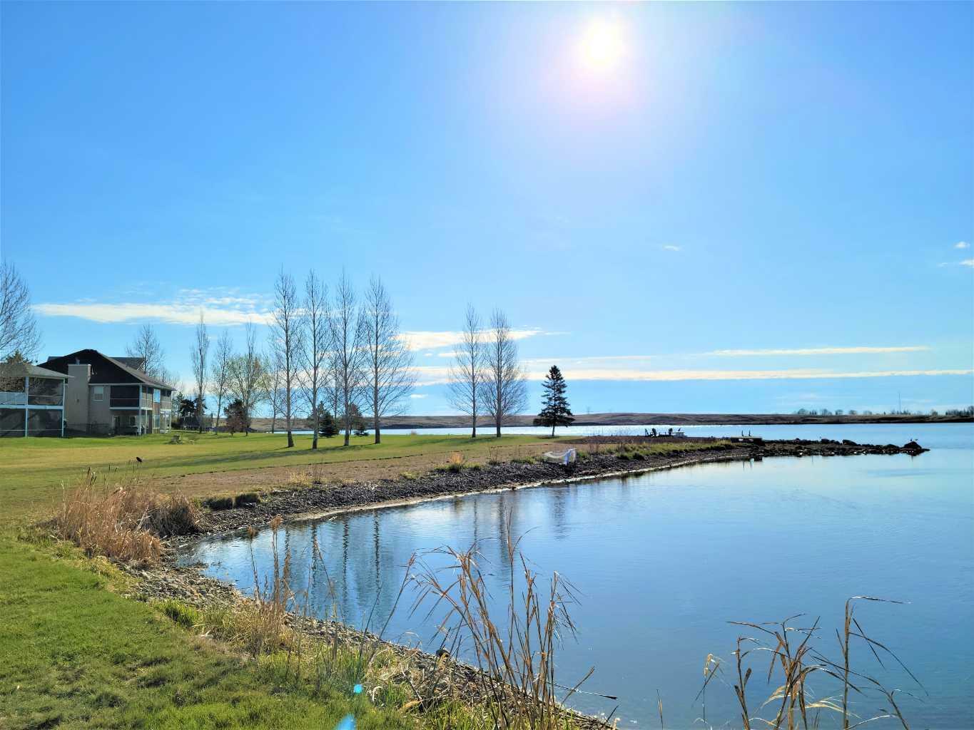 Property Photo:  27 Blue Heron Bay  AB T1R 0X5 