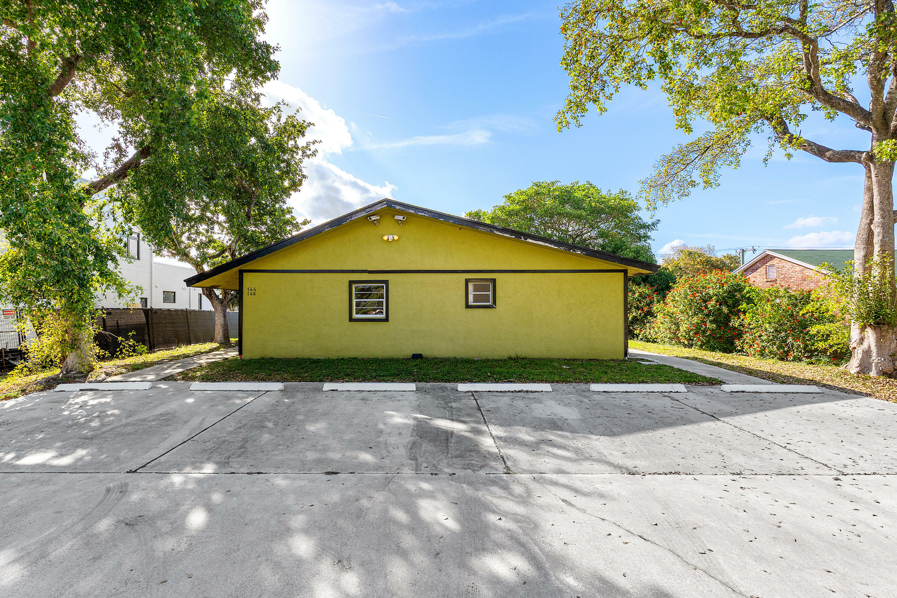 Property Photo:  144 SW 2nd Avenue  FL 33444 