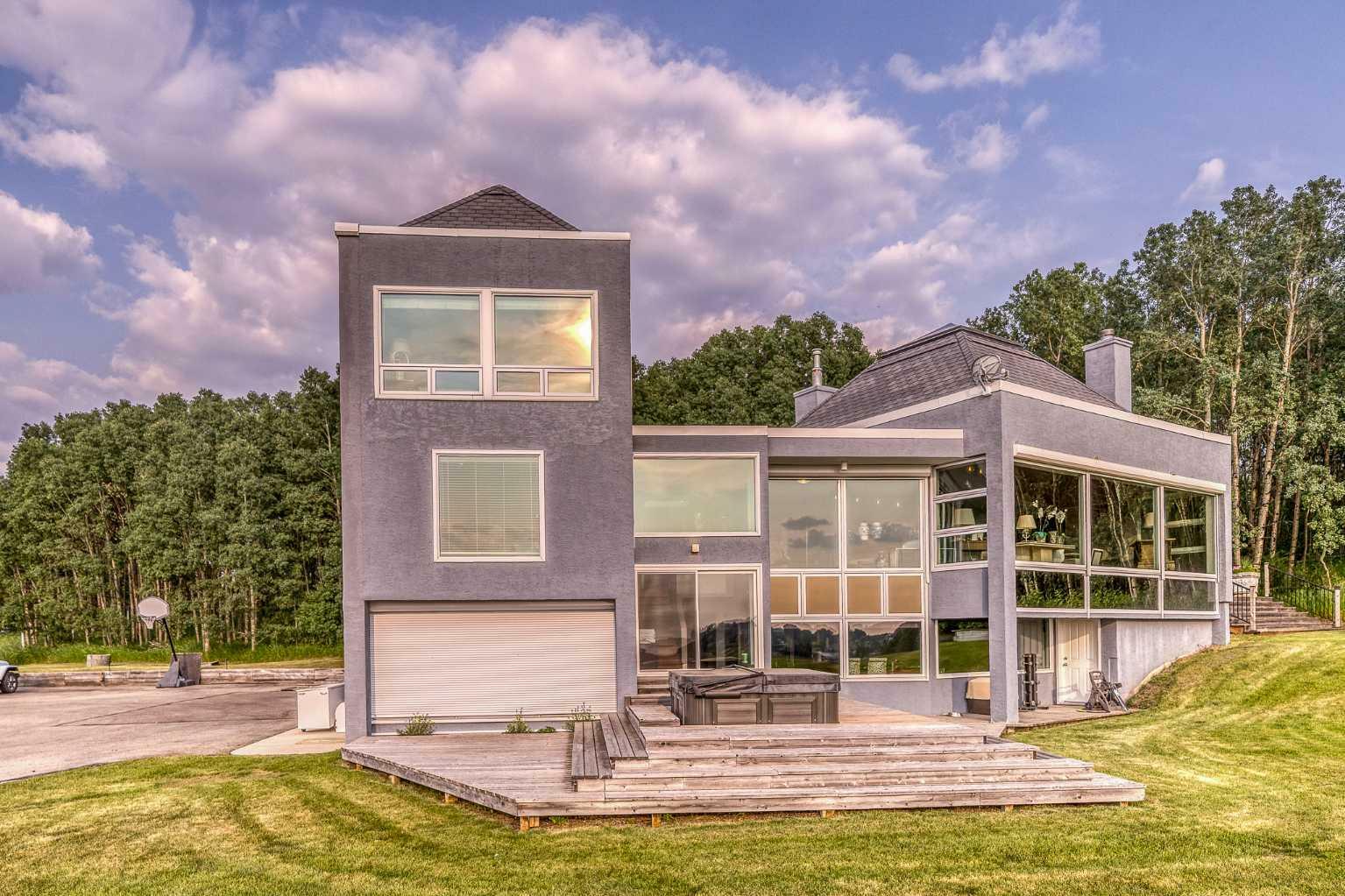 Property Photo: 244114 Panorama Ridge SW AB T3Z 3L6
