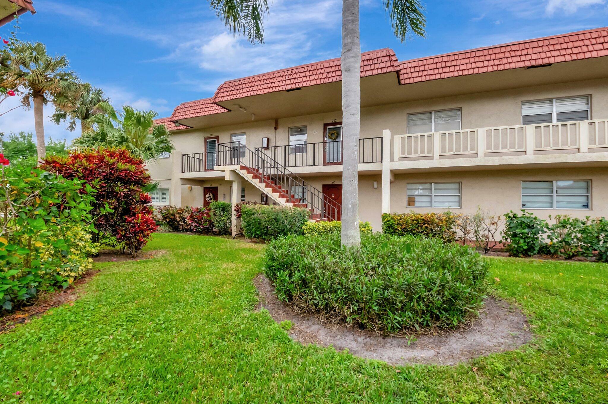 Property Photo: 1 Abbey Lane 201 FL 33446