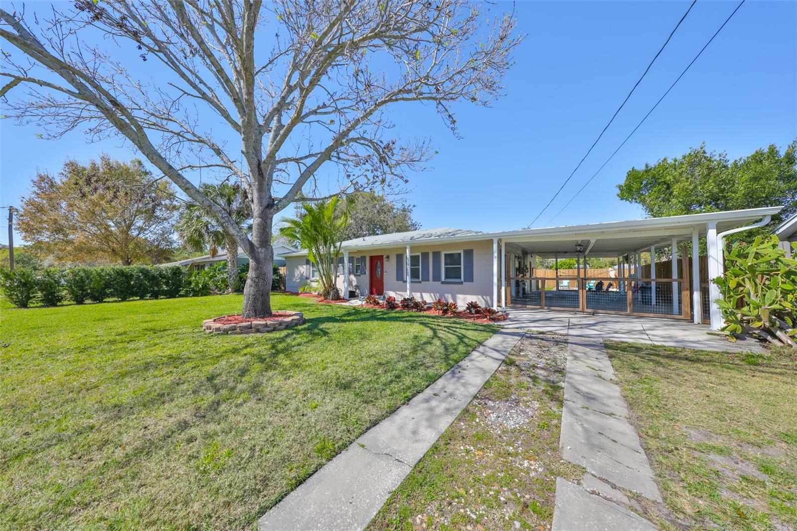 Property Photo:  3911 W Wallace Avenue  FL 33611 