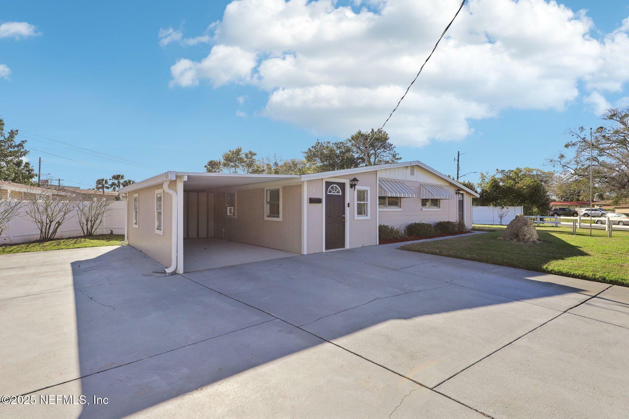 Property Photo:  340 Sailfish Drive E  FL 32233 