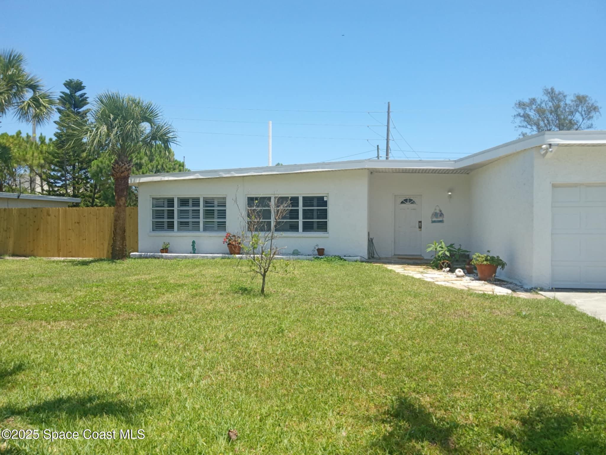 Property Photo: 112 Sunset Drive FL 32931