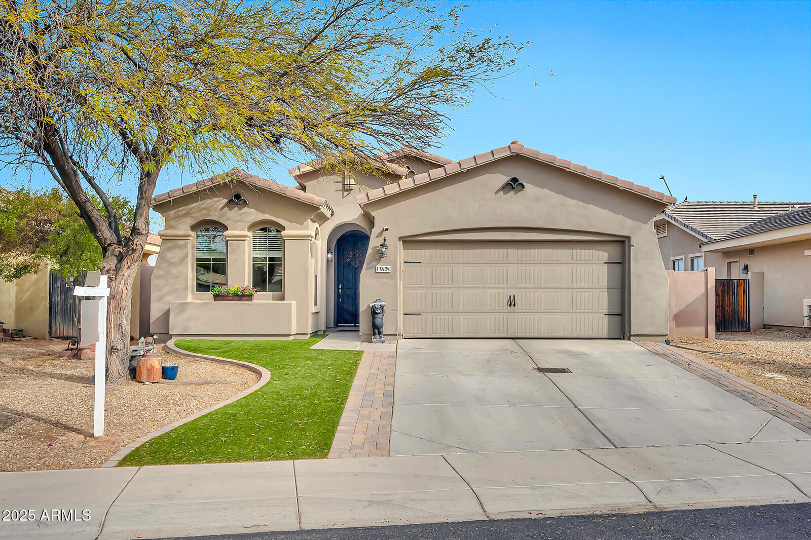 Property Photo: 10780 W Woodland Avenue AZ 85323