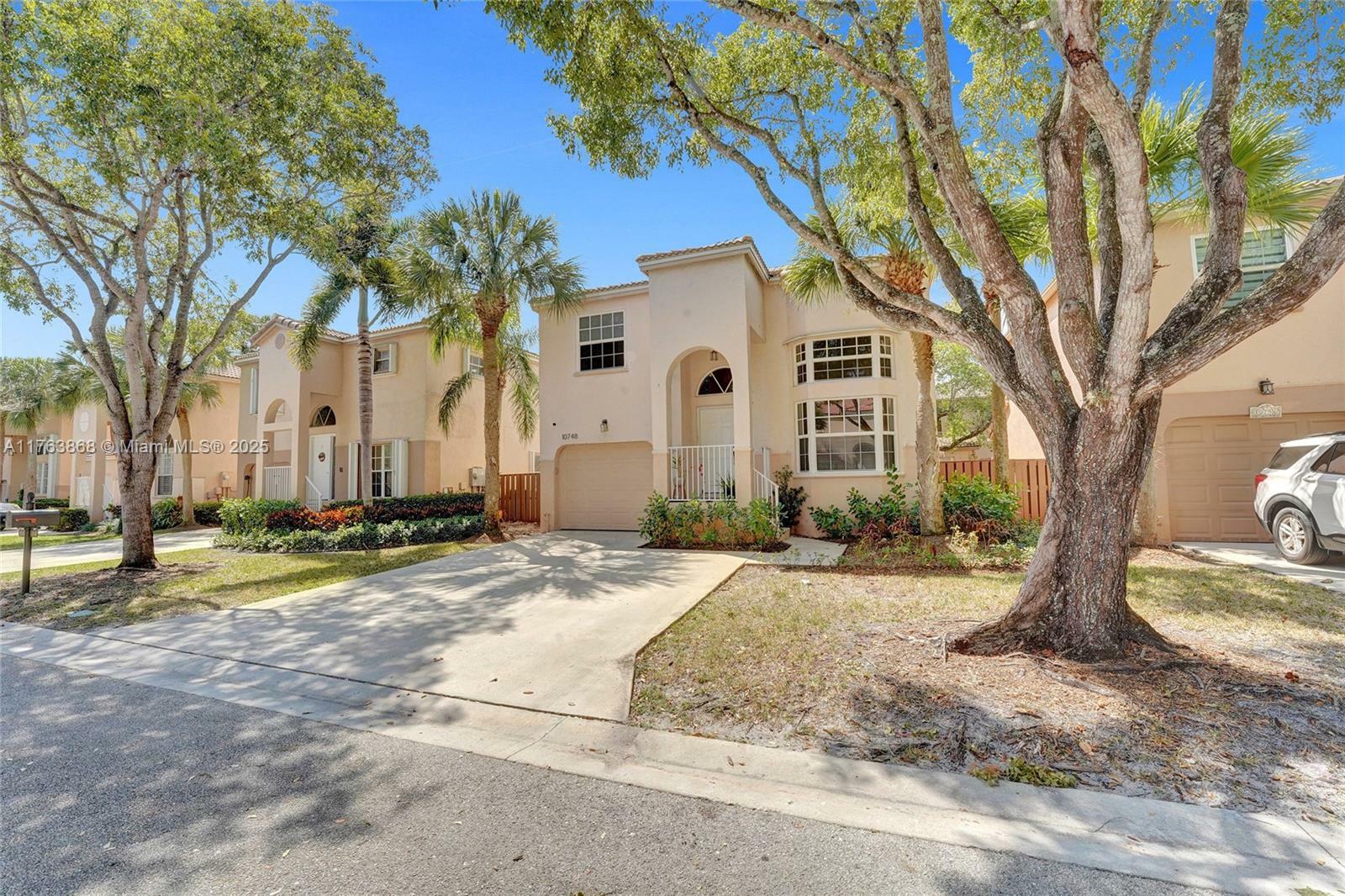 Property Photo:  10748 NW 12th Mnr  FL 33322 