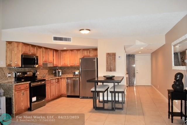 Property Photo:  49 Deer Creek Rd E105  FL 33442 
