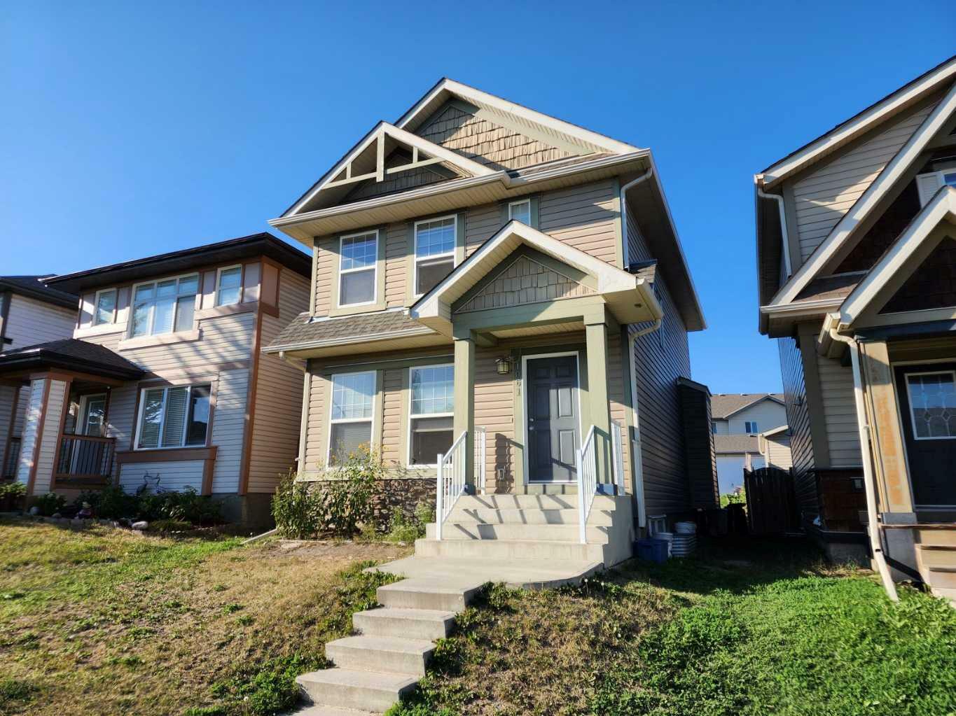 Property Photo: 1061 Panatella Boulevard NW AB T3K 0R3