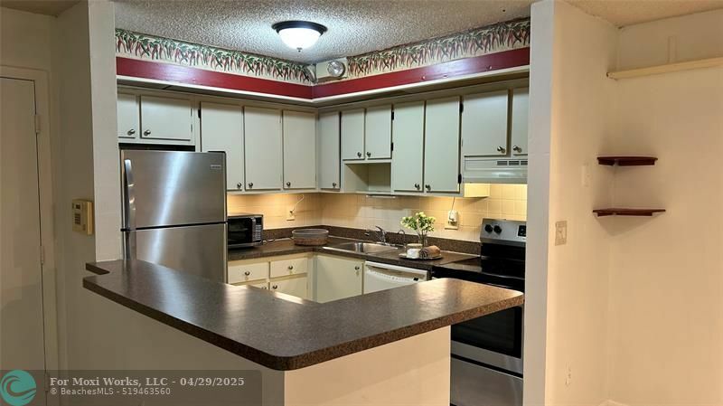 Property Photo: 9702 S Belfort Cir 112 FL 33321