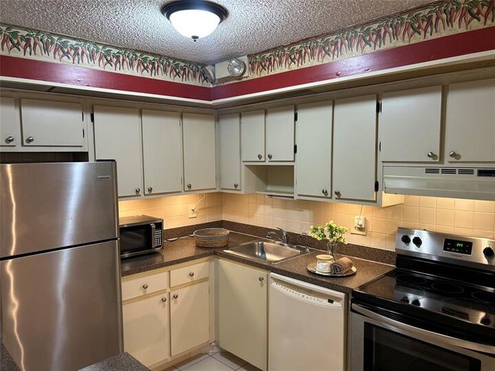 Property Photo:  9702 S Belfort Cir 112  FL 33321 