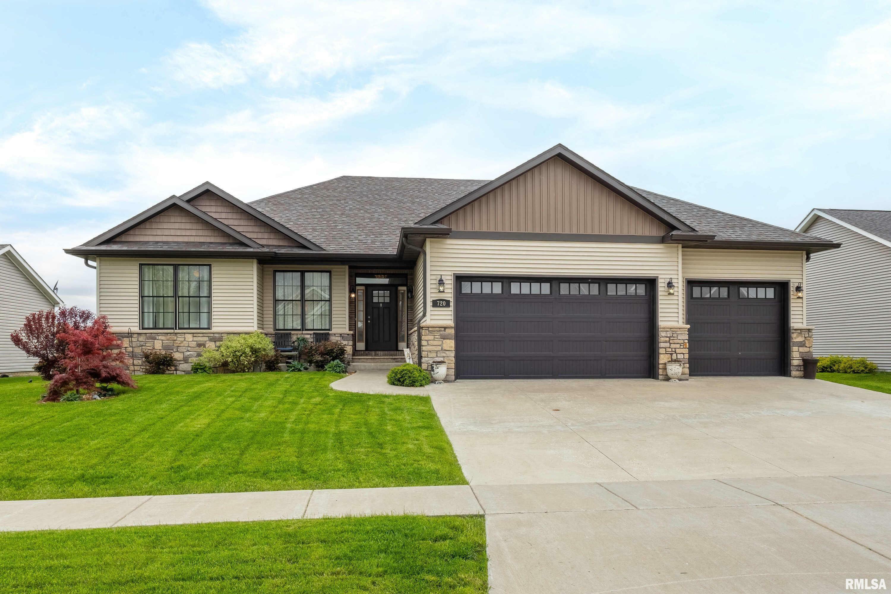 Property Photo: 720 Deer Woods Drive IA 52802