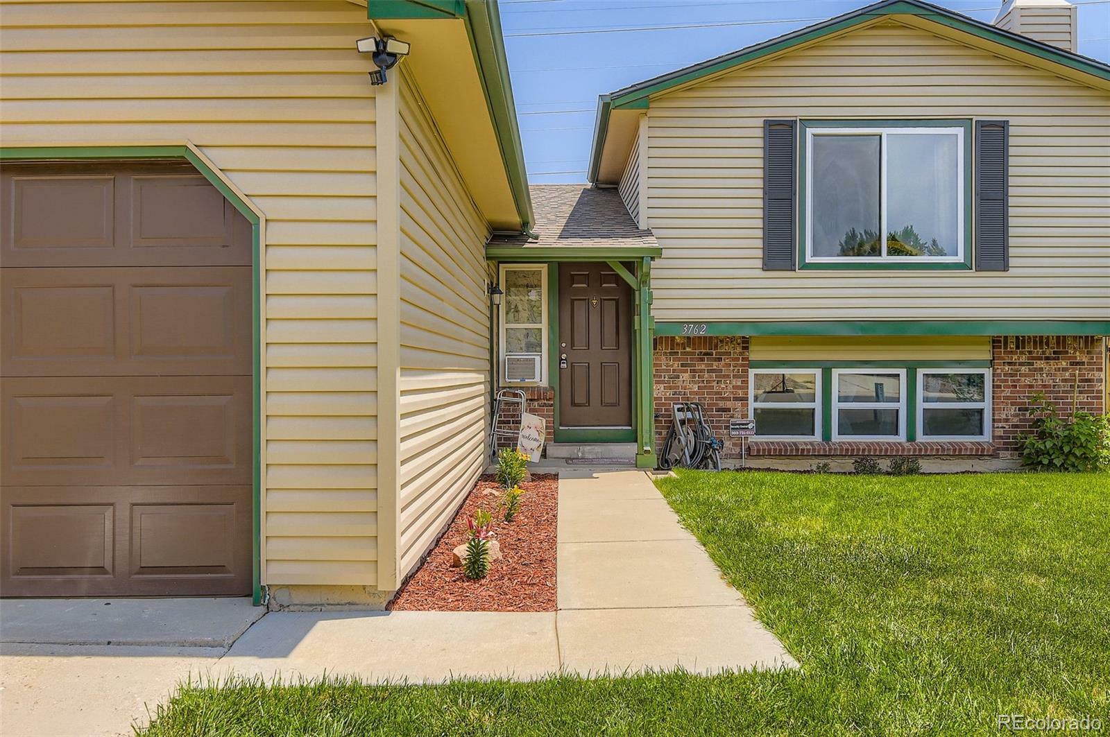 Property Photo: 3762 S Halifax Street CO 80013