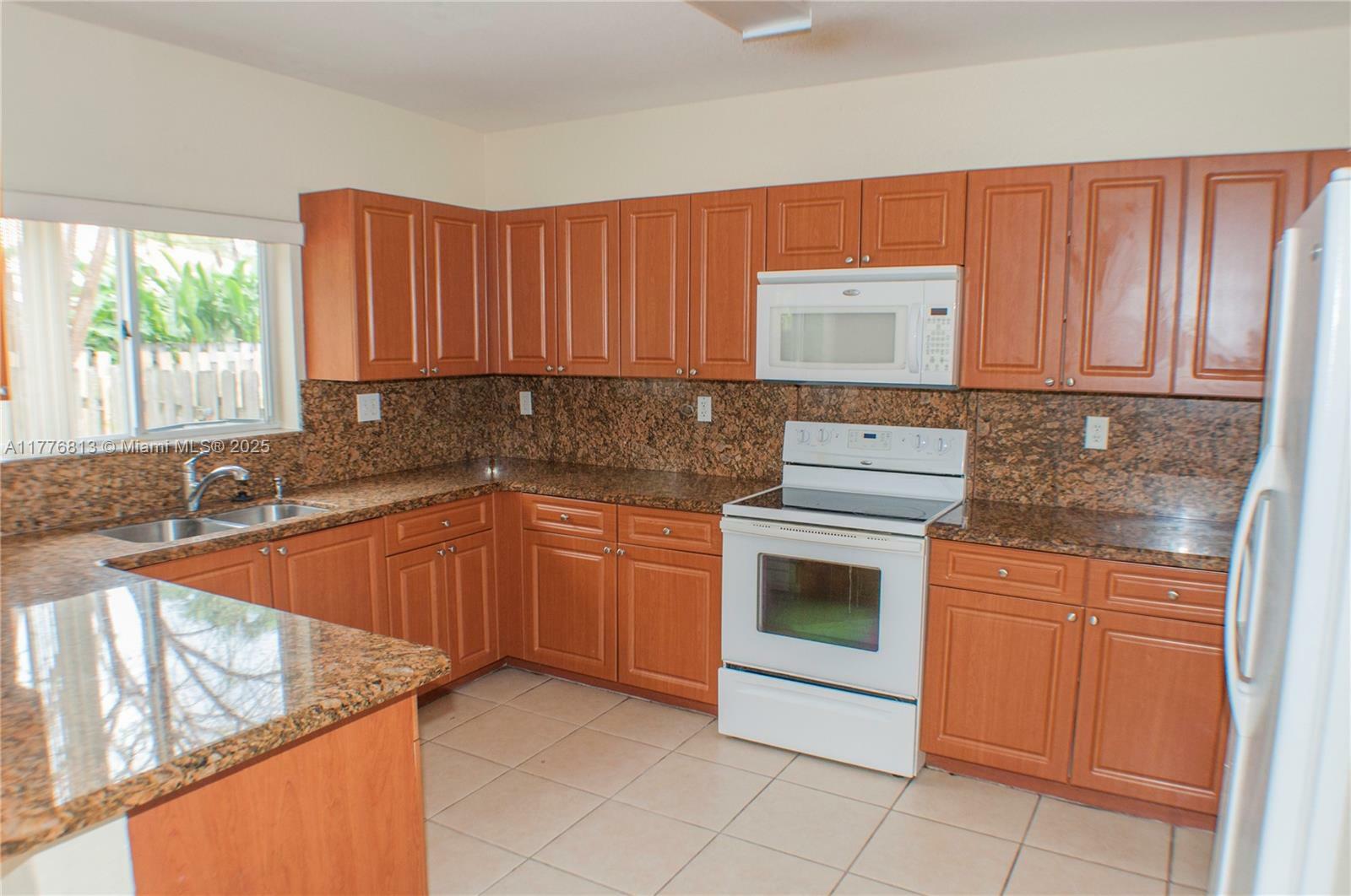Property Photo: 5612 SW 162nd Pasg FL 33193