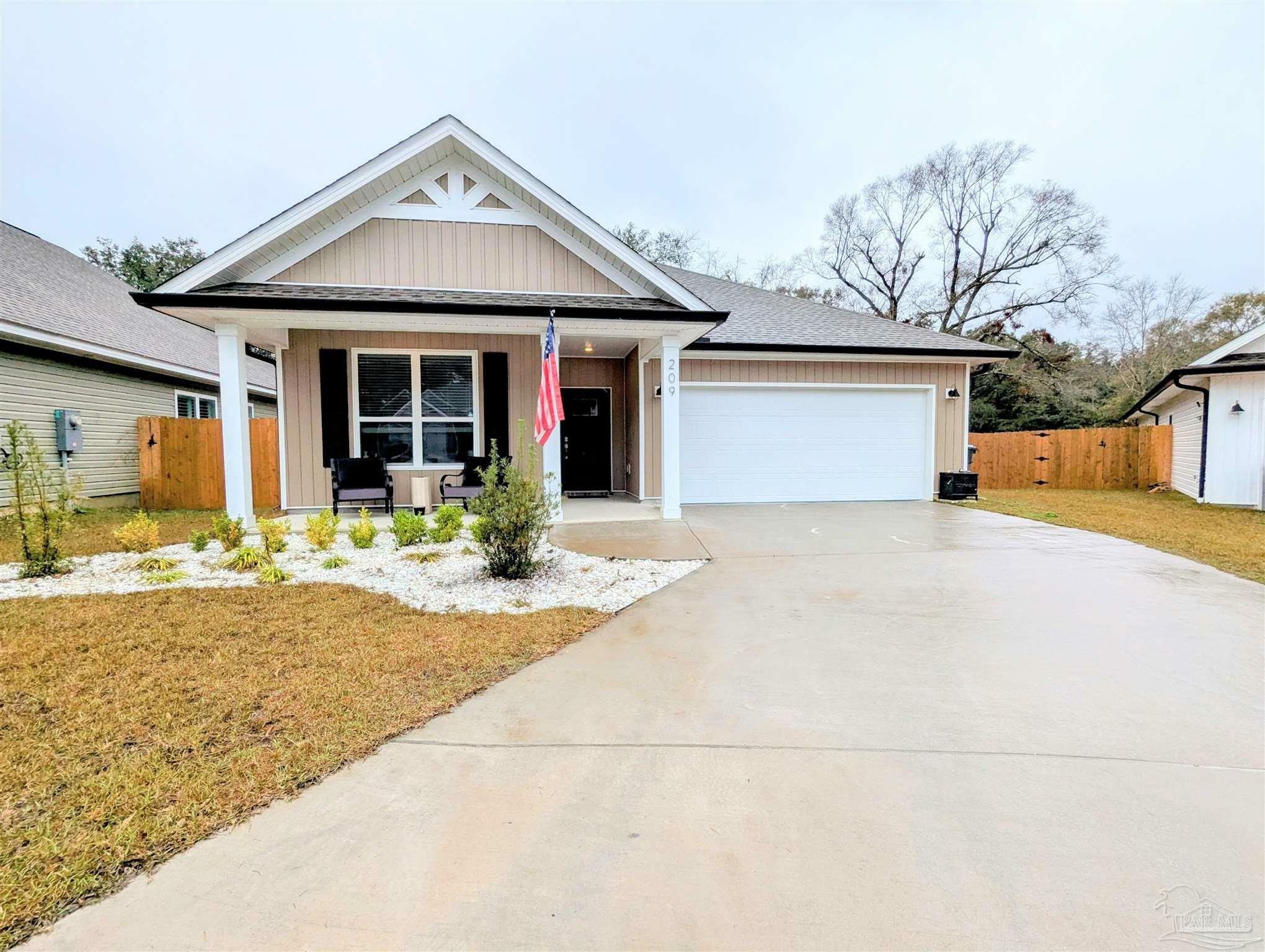 Property Photo: 209 Camellia Dr FL 32533