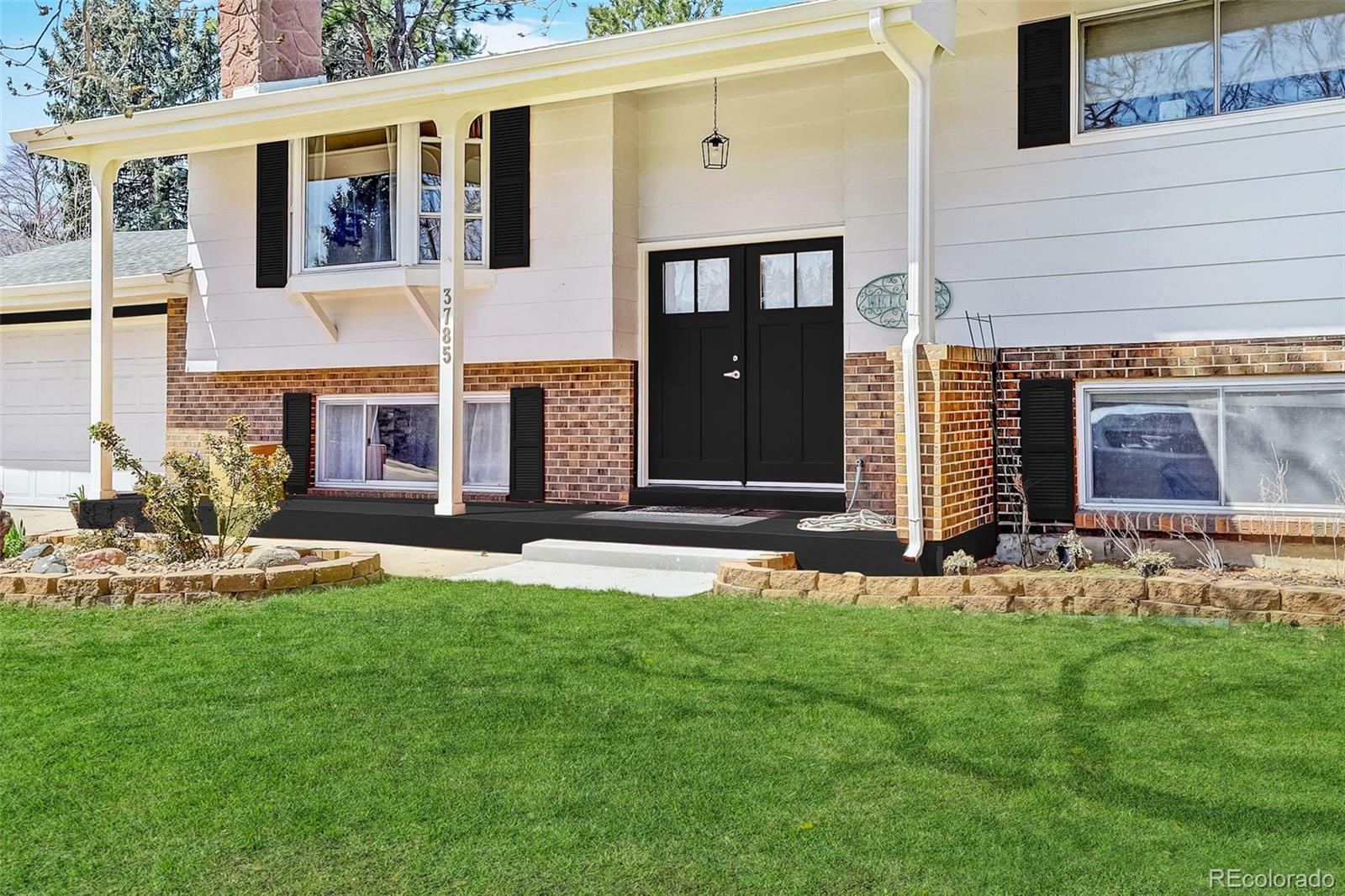 Property Photo: 3785 S Benton Way CO 80235