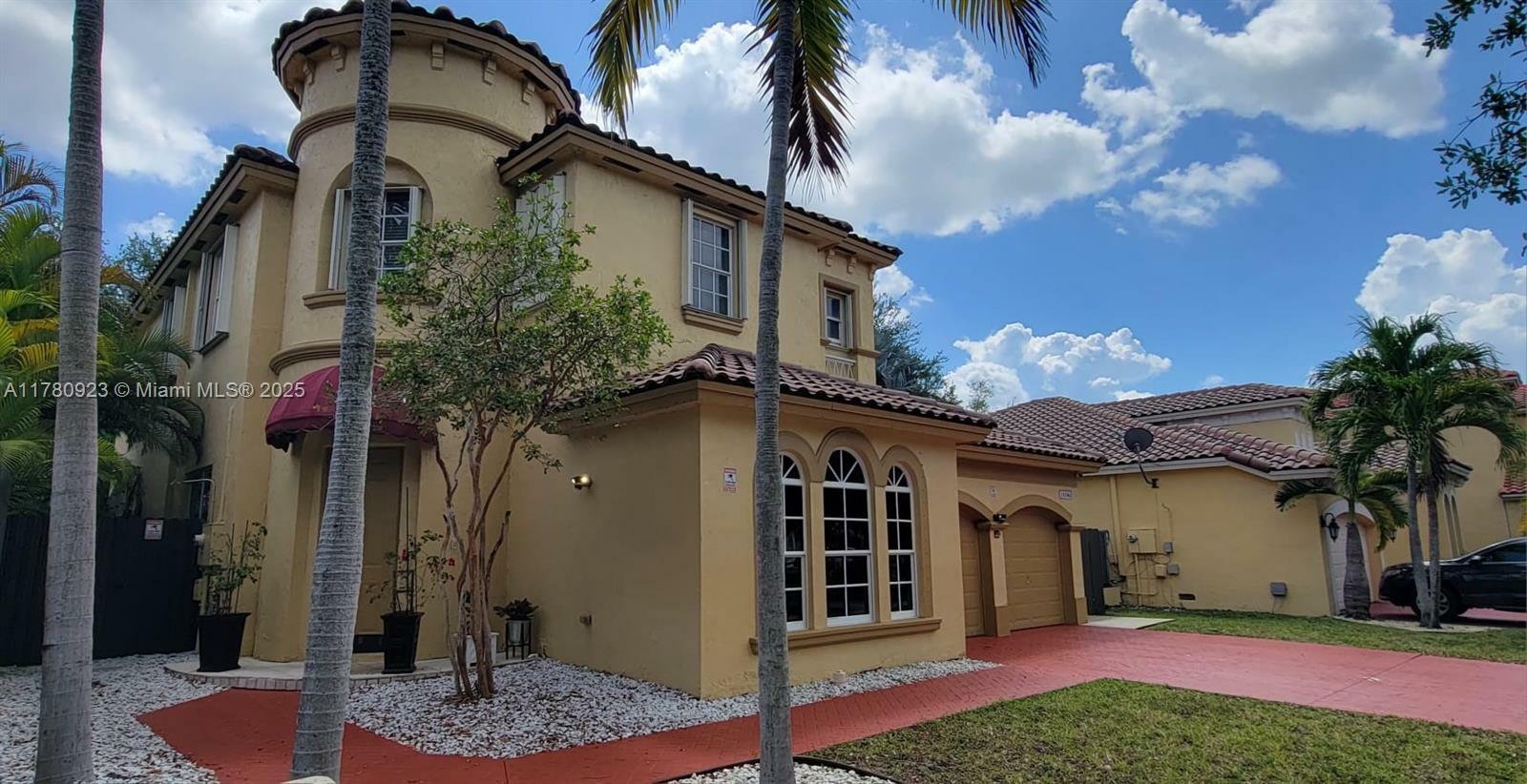 Property Photo: 14106 SW 54th St FL 33027